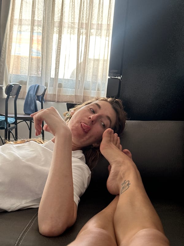 Person photographed relaxing on sofa in Baan Chaweng