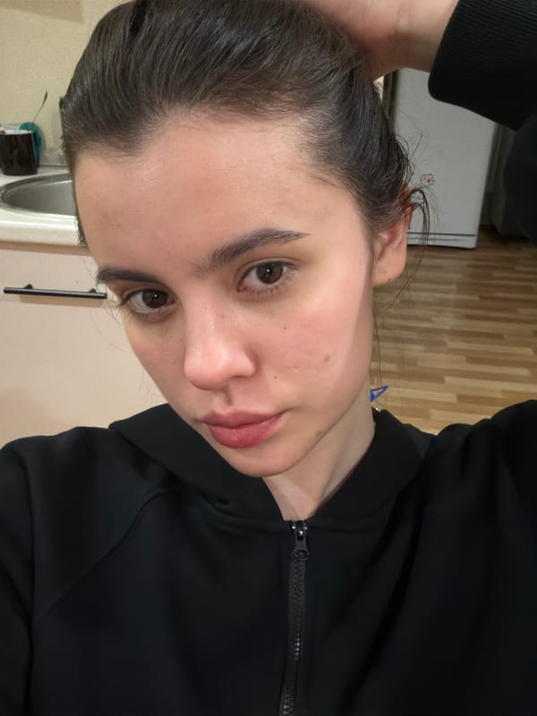 Woman takes selfie during home gathering in Perm