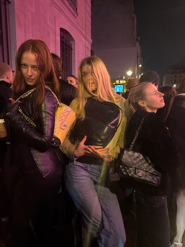 Evening dining and street activity documented in Paris restaurant district