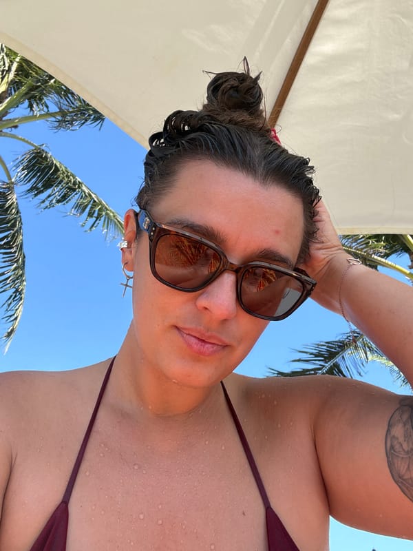 Woman walks tropical path in Medahan Indonesia morning