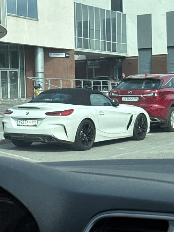 BMW Z4 and Lexus RX parked near Kuibyshev Street, Yekaterinburg