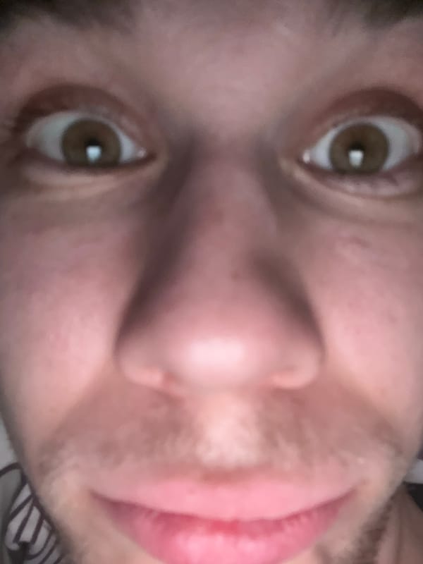 Man resting indoors captured in detailed room documentation