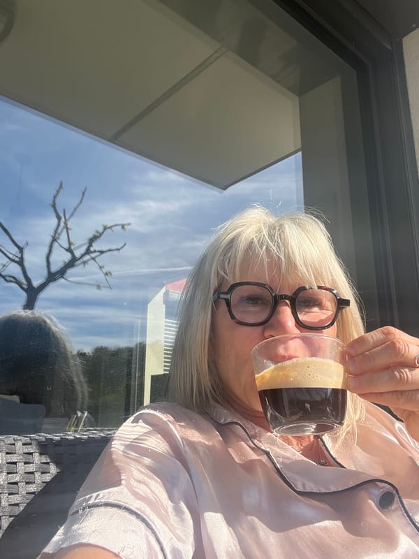 Person documents morning routine with pet in French village