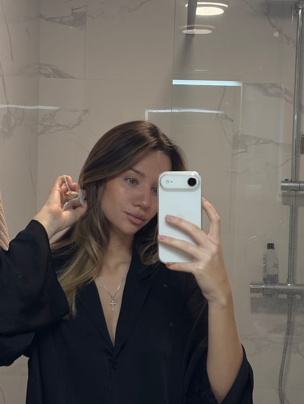 Woman's morning documented through selfies, cafe visits, street walks