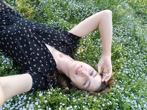Woman photographed in flower field in Chaikovsky, Russia