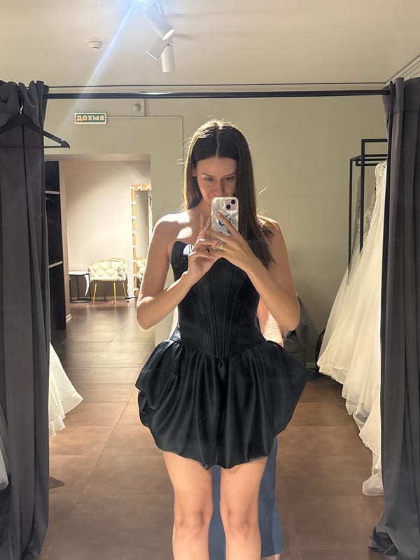Fitting room mirror selfie in black dress, Krasnoyarsk