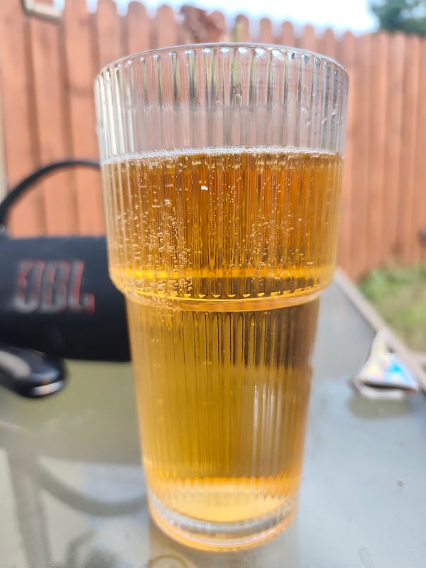 Drinks, a vape, and cloudy skies at an Irish outdoor hangout