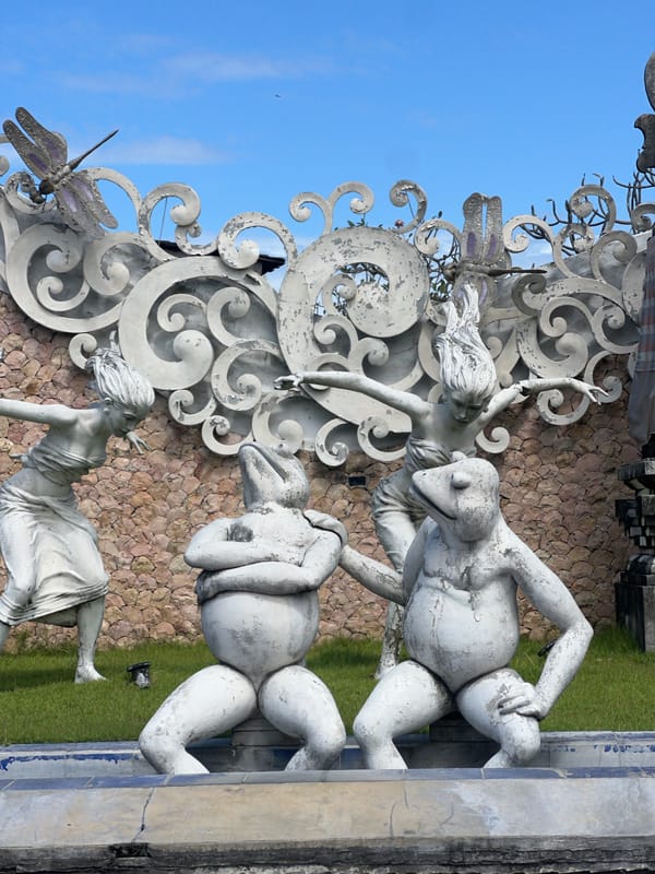 Morning documentation of Balinese decorative statues and street scenes