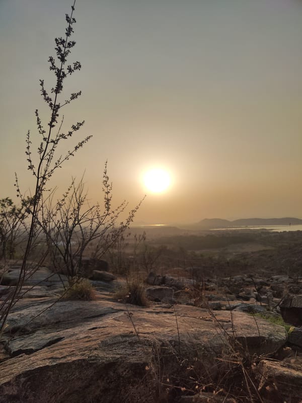 Golden hour photograph captured in Puttaparthi's rocky terrain