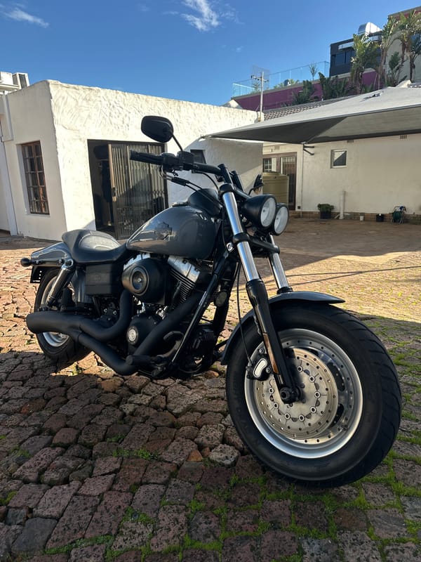Vintage vehicle collection documented in Cape Town garage and residential area