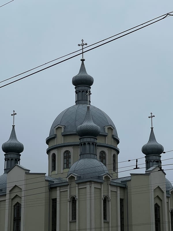 Morning street life and Orthodox architecture observed in Ternopil