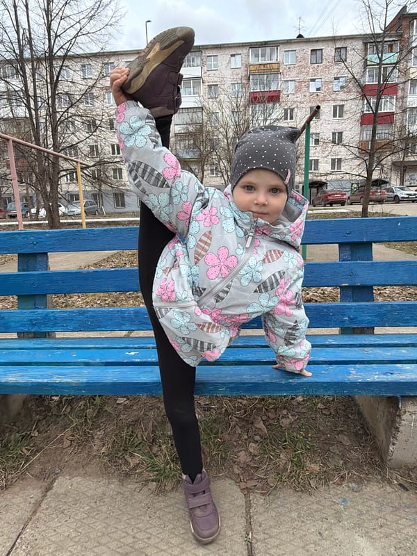 Child plays on park bench in Votkinsk, Russia