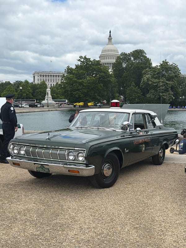 Vintage Police Cars Displayed Near U.S. Capitol in Washington