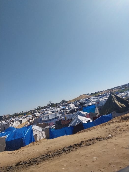 Daily life documented across Gaza displacement camps, damaged areas