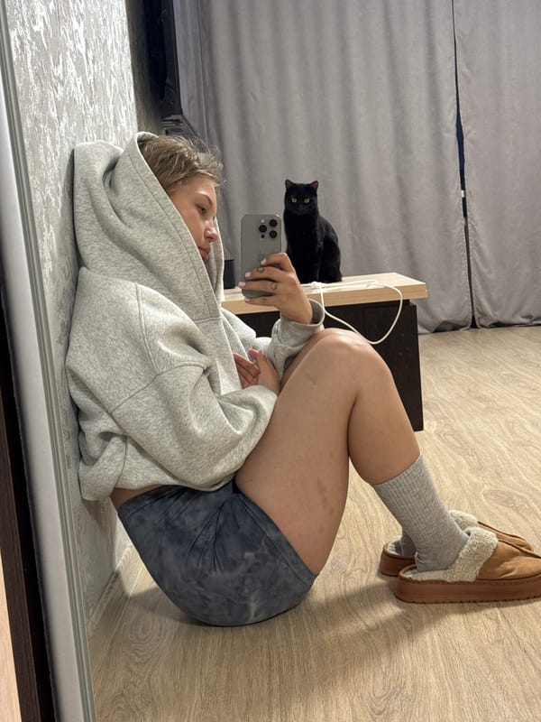 Woman photographed indoors, damaged car documented in Chaikovsky