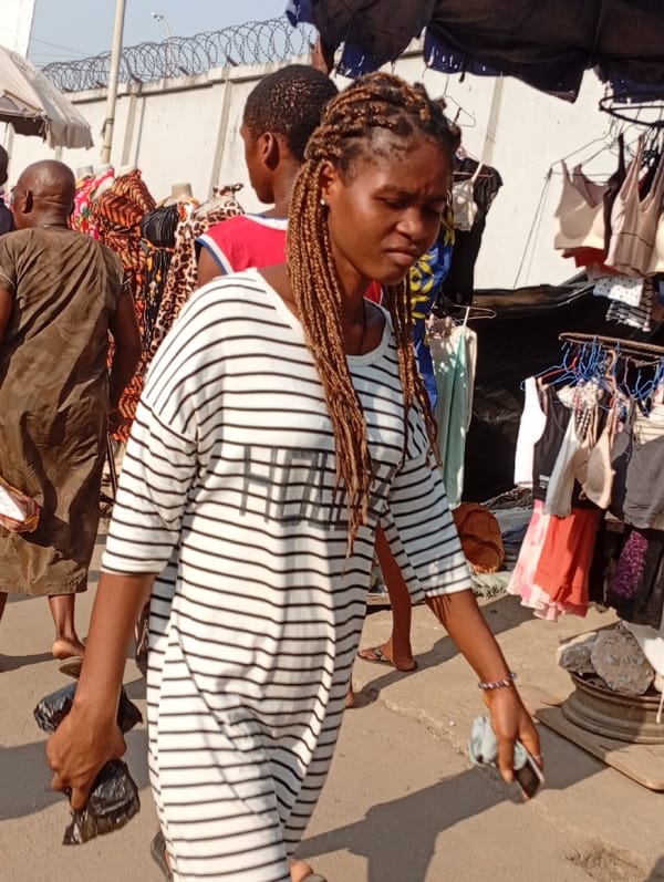 Daily life documented at Nigerian markets during afternoon hours