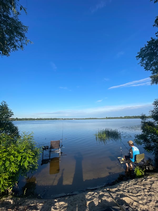 Peaceful morning fishing on the Dnipro River near Kozyn