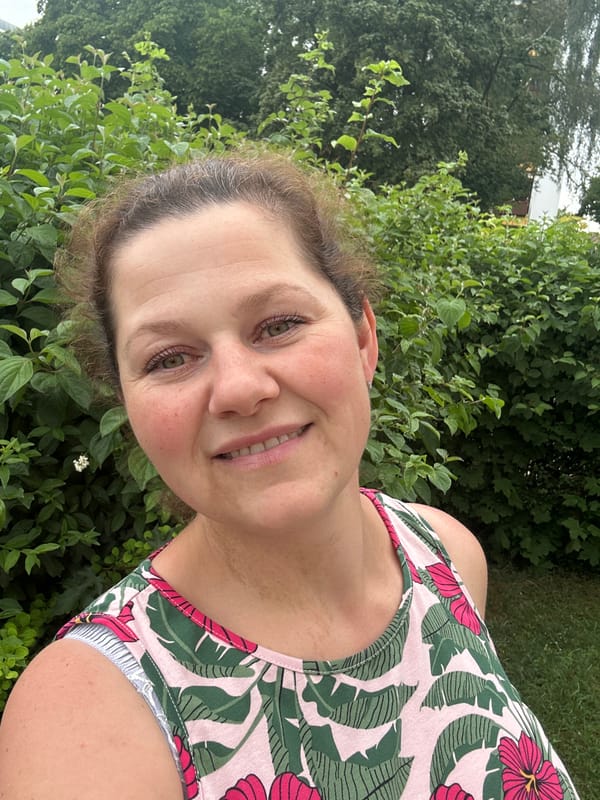 Woman takes selfie outdoors in Ergolding, Germany