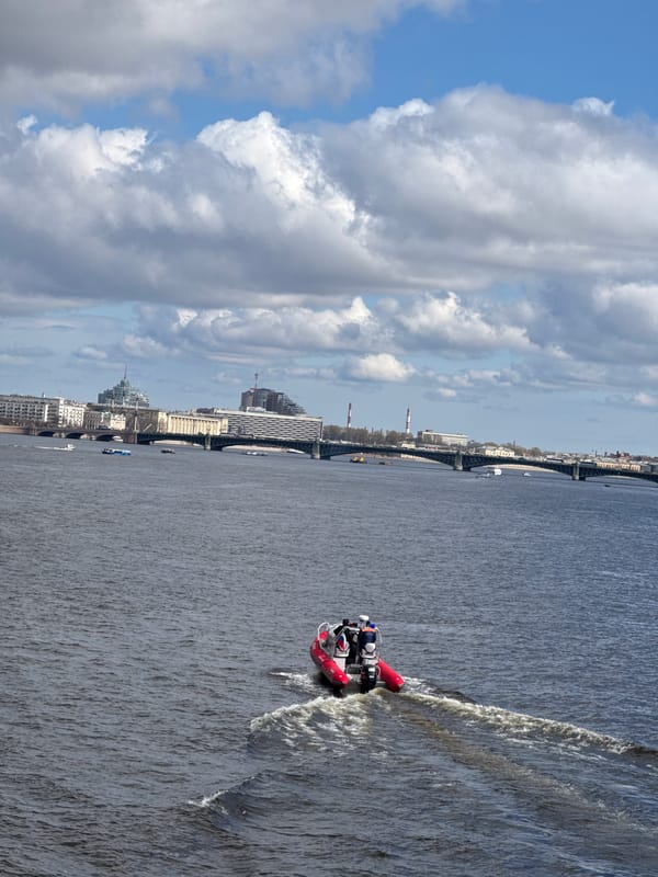 Red inflatable boat spotted on Saint Petersburg waterway