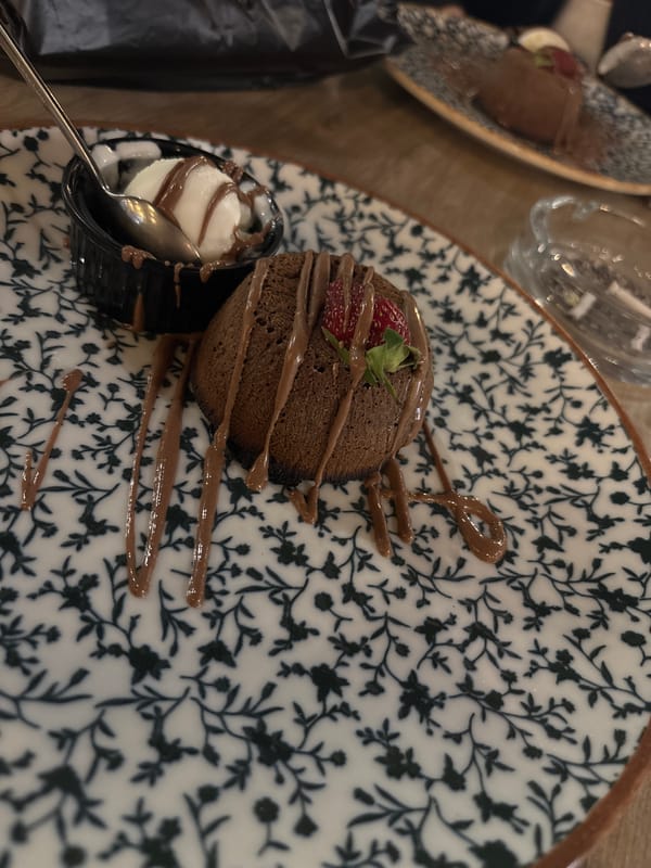 Dining experience documented with desserts, meals, and personal touches