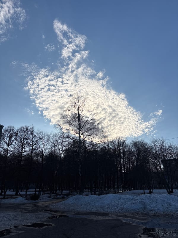 Spring weather scene captured in Ulyanovsk with clouds and snow
