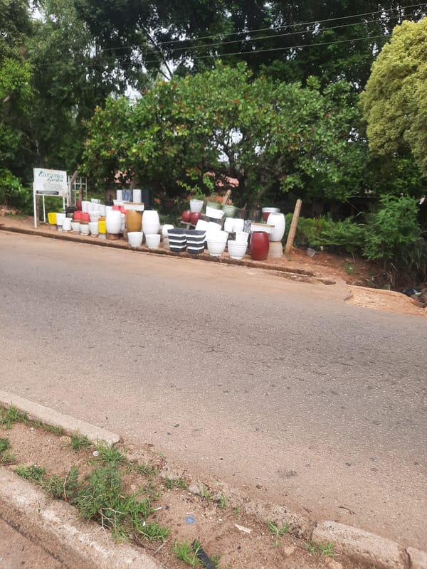 Daily street life documented across Jos, Nigeria neighborhoods