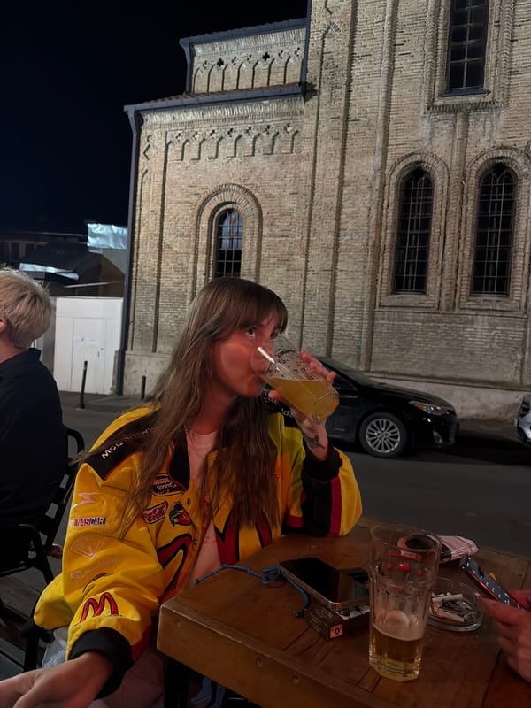 A casual night out at a Tbilisi bar, yellow jacket and all.