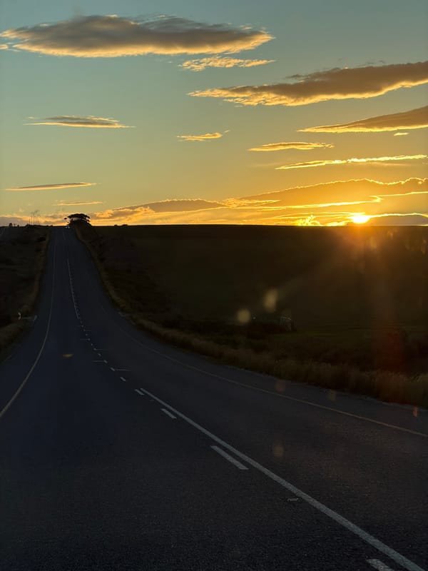 Golden hour sunset documented on South African coastal road
