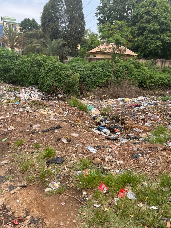 Urban scenes documented in Jos: waste dump, tire shop