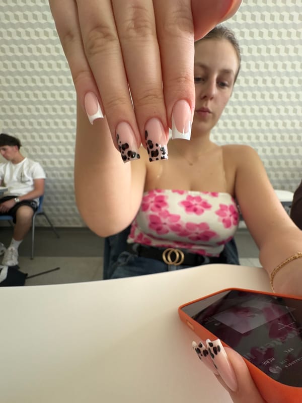 Students take playful selfies during morning classroom time in Burgas