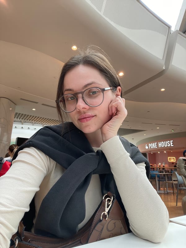 Woman shops at Venice mall featuring car display