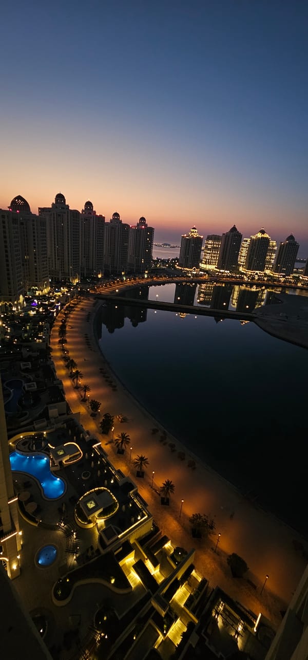 Aerial dusk views over The Pearl-Qatar, Doha