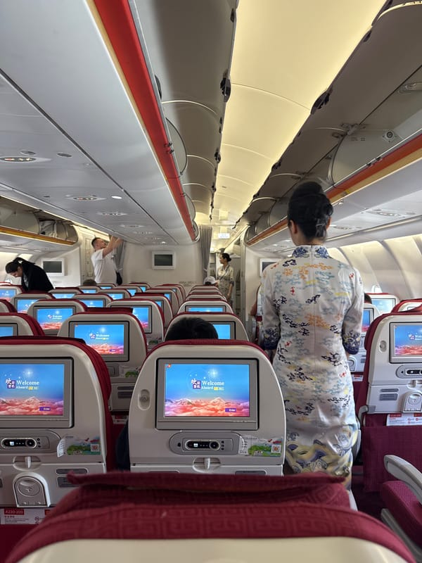 Passenger captures airplane cabin interior during boarding process