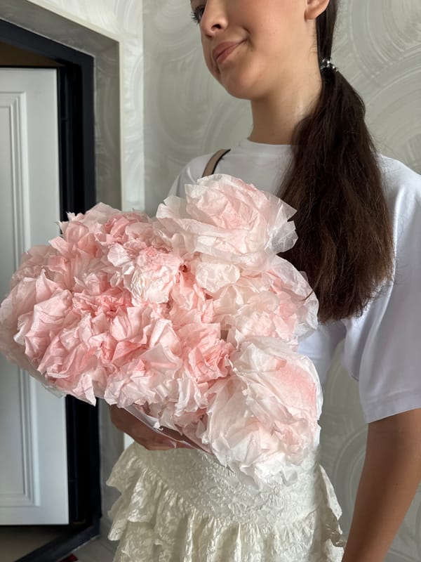 Paper flower bouquet moment on a Sochi street