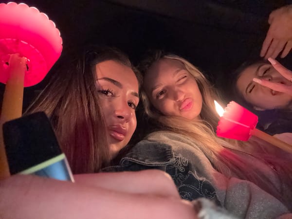 Three women photographed during evening social gathering in Plovdiv