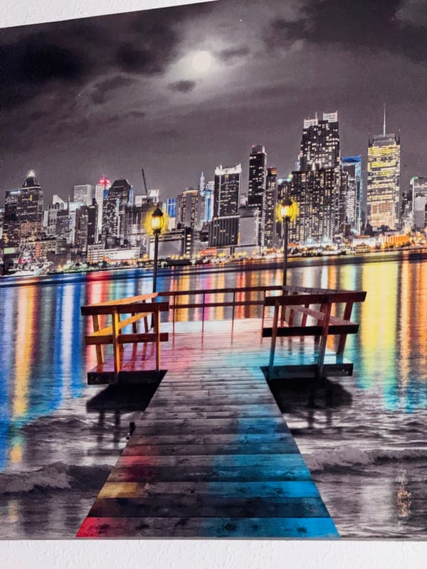 Full moon illuminates Netanya waterfront from wooden pier