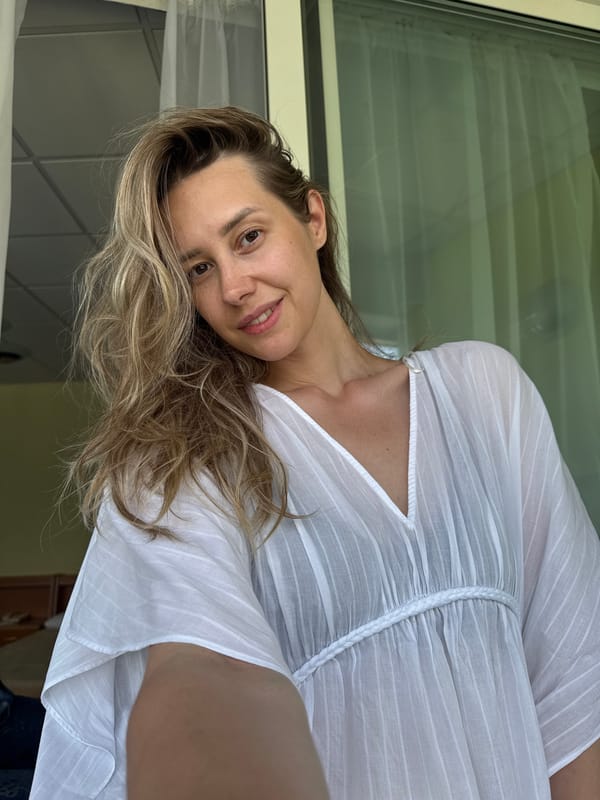 Woman documents summer morning with selfies in Nebug, Russia