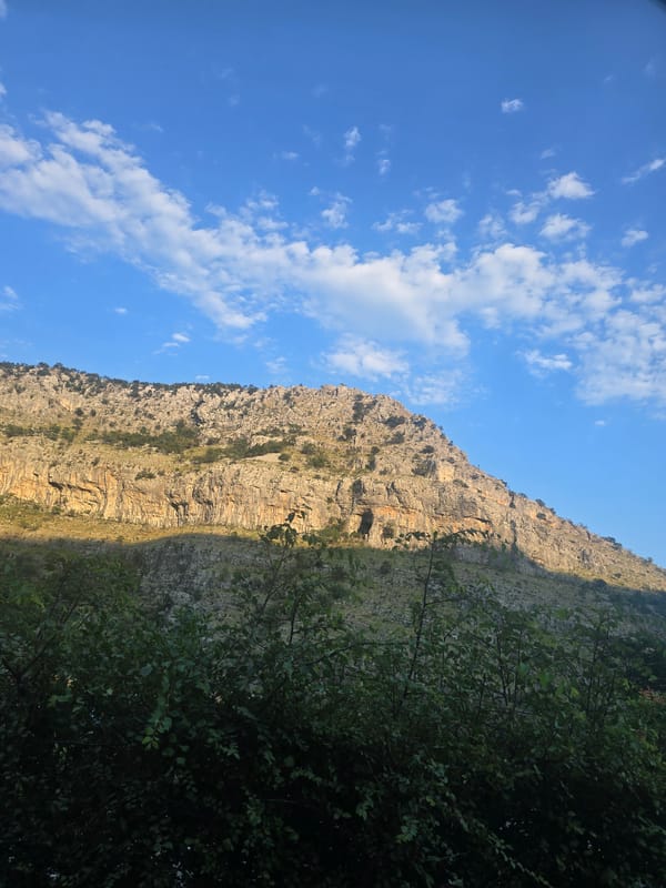 Orthodox churches, mountain views, and a valley city at sunset