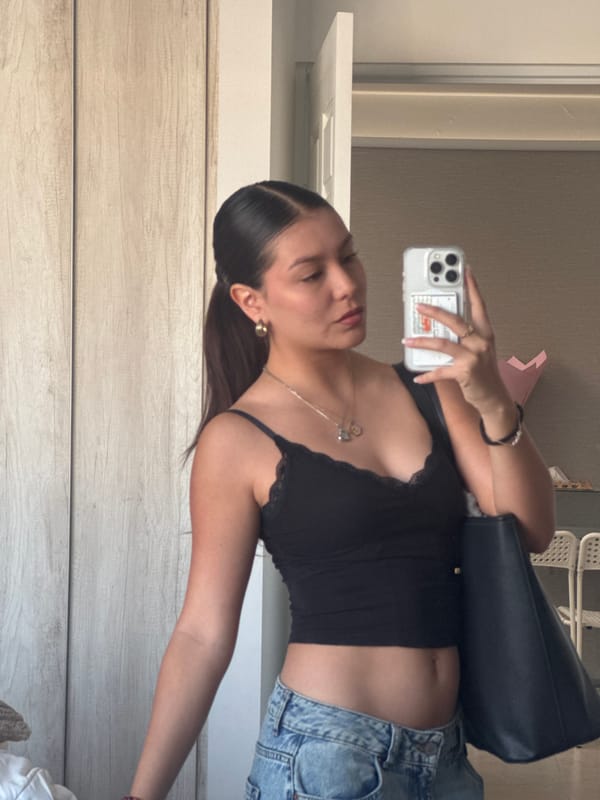 Woman takes mirror selfies in San Francisco Ocotlán, Mexico