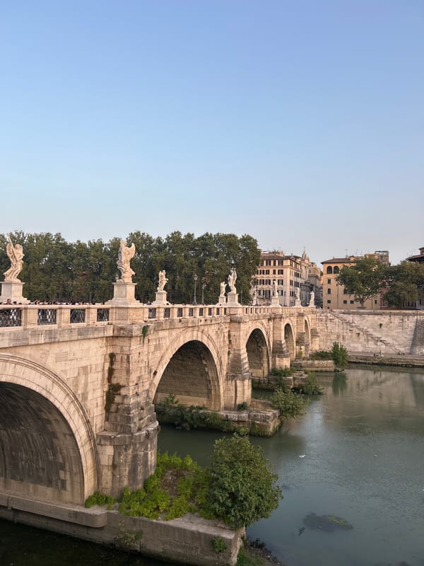 Evening stroll along Ponte Sant'Angelo, Rome