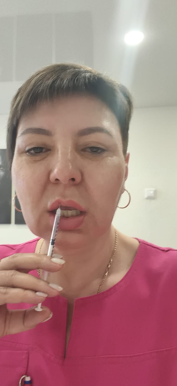 Beauty routine documented: multiple skincare creams and application captured