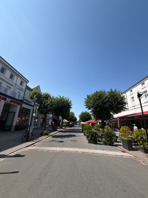 Sunny morning stroll through Rostock's old town streets