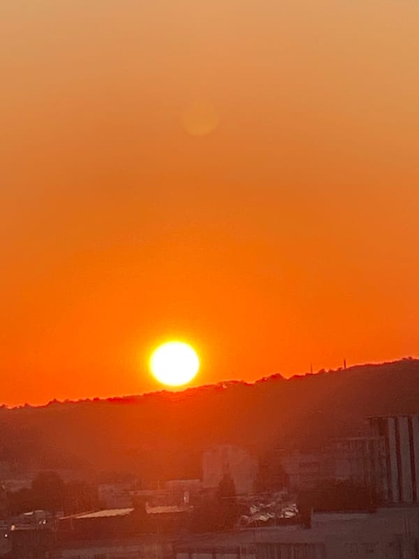 Sunset over Chișinău skyline, golden hour from multiple angles