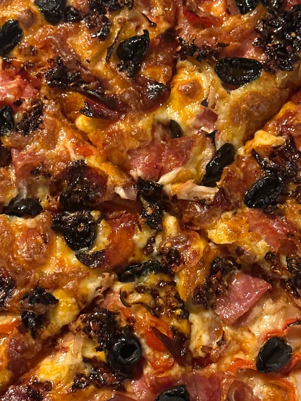 Pizza dinner documented in Kent with etiquette message