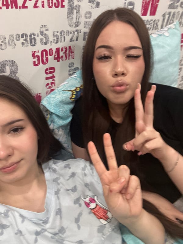 Friends Take Selfies During Bedroom Photo Session in Russian City