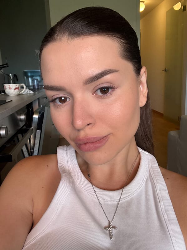 Close-up selfie series in Prague, white tank top and cross necklace