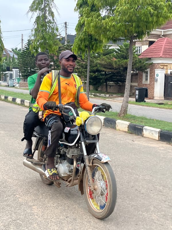 Early morning street life on a residential road in Abuja
