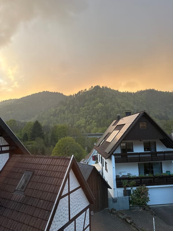 Sunset observed over forested mountains in Forbach, Germany