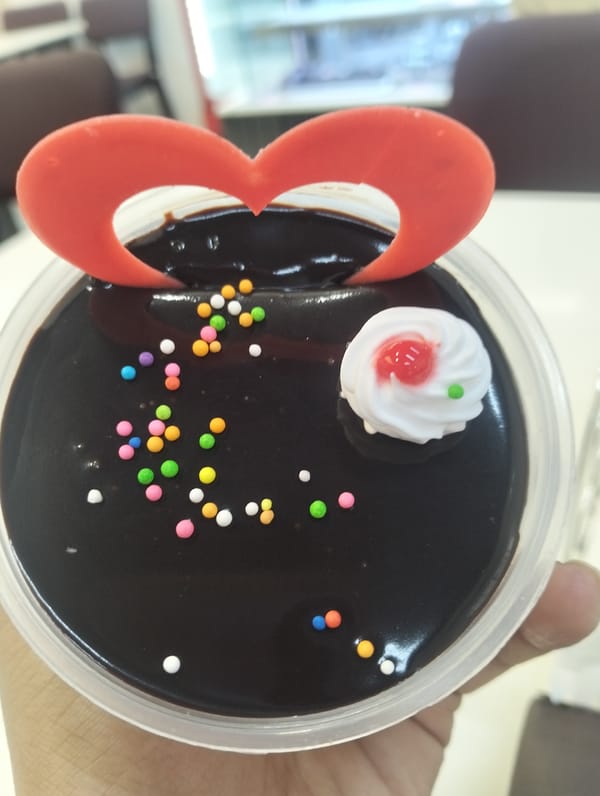 Layered chocolate dessert documented in Dhaka, Bangladesh