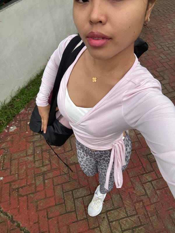 Selfie walk along Davao's brick path, yoga mat in tow